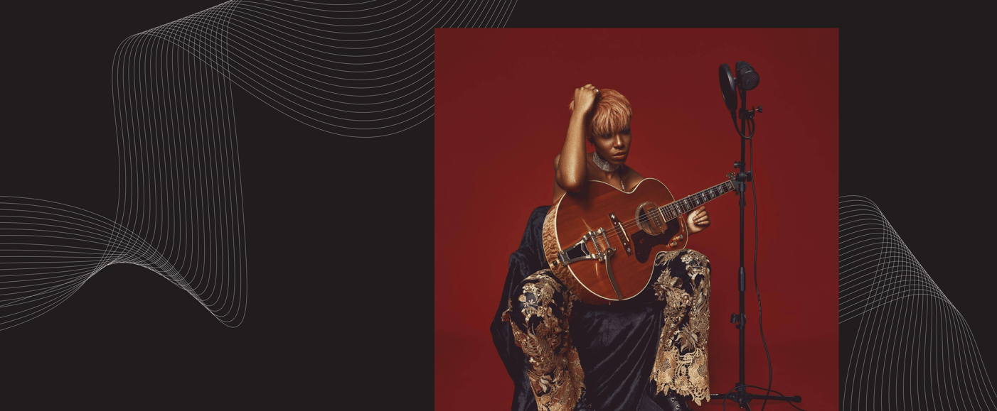 Music artiist SAJE with her guitar