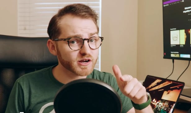 Brady Jordan recording in a home studio set up using Soundstripe for premium royalty free music