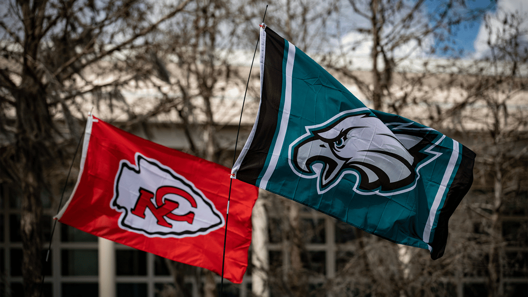 Kansas City Chiefs and Philadelphia Eagles flags represent the two teams in Super Bowl LIX, for which Soundstripe ranked the Big Game ads.