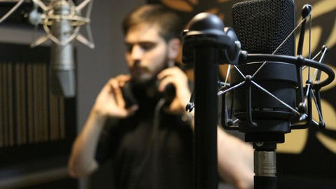 How to Voice Over a Video: Expert Tips for Recording Voice Overs + Background Music for Voice Over Projects