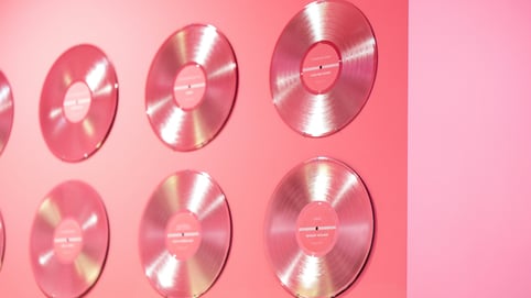 pink records on a pink wall