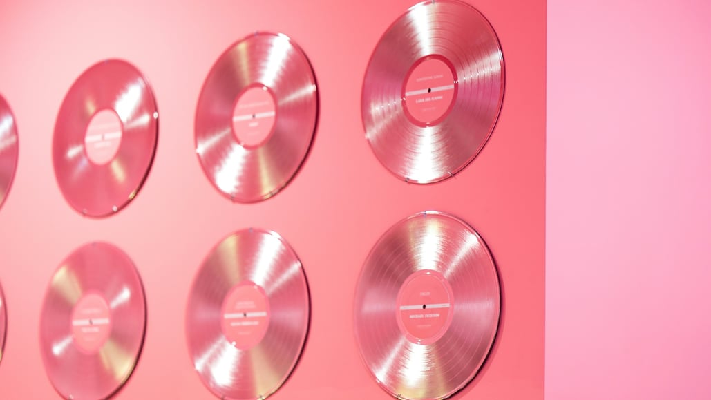 pink records on a pink wall